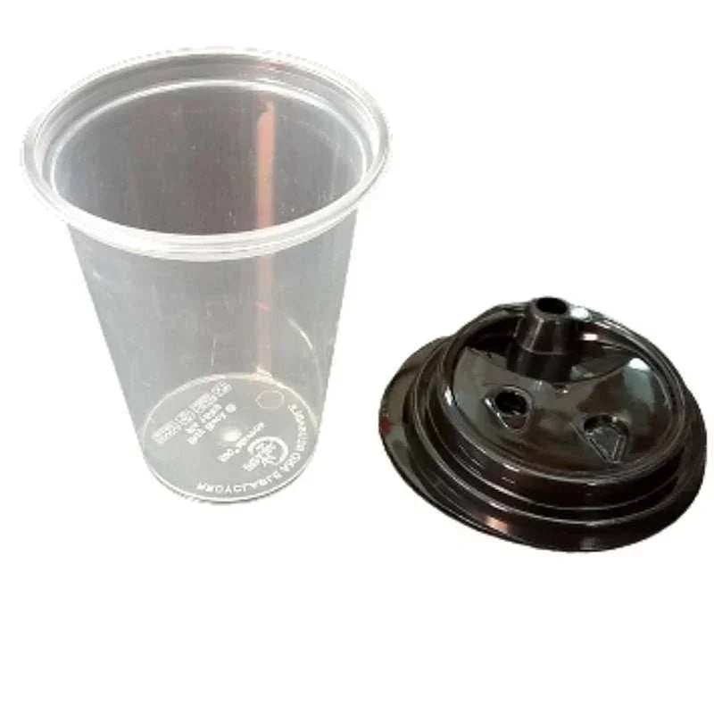 Clear disposable plastic cup with black plastic lid for beverages